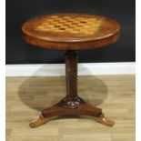 A 19th century mahogany circular pedestal games table, moulded tilting top inlaid for chess, above a