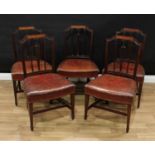 A set of five Sheraton design mahogany dining chairs, carved splats, tapered square legs, H-