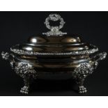 A Rococo Revival silver-plated tureen and cover, bold lion paw feet, shell-capped twin-handles,