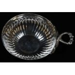 An Elizabeth II cast silver fluted wine taster, of 18th century French design, twin-serpent
