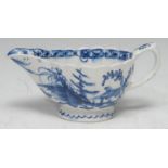 A Bow sauce boat, painted with cottage and foliage, the interior with band of stars and foliage,