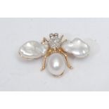 A free form pearl and diamond insect brooch, as a bee, free form pearl wings, pear drop cultured