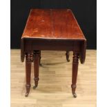 A George/William IV mahogany telescopic dining table, rounded rectangular fall leaves to ends,