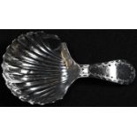 A George III provincial silver caddy spoon, shell bowl, bright-cut stem, 7cm long, Richard Ferris,