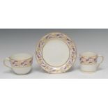 A Pinxton coffee can, Bute shape tea cup and saucer, pattern No. 275, decorated in puce and gilt