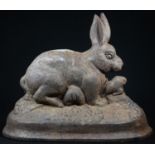 A cast iron door stop, as a rabbit, 34cm wide