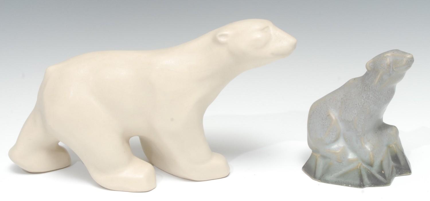 A Langley Mill Oakes period stoneware polar bear, in the white, 26cm long, c.1938; another, on