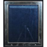 A large Elizabeth II silver rectangular easel photograph frame, quite plain, 30cm high, the aperture