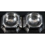 A pair of George II silver incurved canted square trencher salts, 7.5cm wide, David Hennell I,