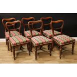 A set of six early Victorian mahogany dining chairs, each kidney shaped back with lotus carved