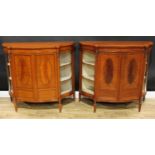 A pair of Sheraton Revival rosewood crossbanded satinwood and marquetry serpentine side cabinets,