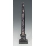 A Grand Tour type amethyst quartz and marble library desk obelisk, stepped square base, 39cm high