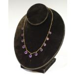 A 15ct gold and amethyst necklace