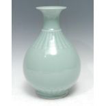 A Chinese celadon ovoid vase, fluted neck, 25cm high, Qianlong seal mark