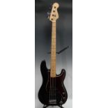 A Fender Precision electric bass guitar, Corona Ca. USA, black body, maple neck, red tortoishell