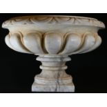 A large 18th century style marble half-fluted compressed campana table urn, evolo rim, square