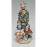 A French Sampson figural scent/perfume bottle, modelled of a courting couple by a tall bush with