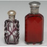 A 19th century silver-mounted and faceted ruby glass scent bottle, prismatic reservoir, milled