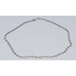 A fancy link diamond collar necklace, articulated bar link toothed body encrusted with sixty round