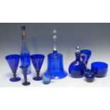 A Victorian blue glass bell, clear glass handle, 37cm high, c.1880; a pair of Victorian wine