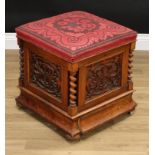 A Victorian walnut ottoman box stool, hinged stuffed over seat, blind fretwork sides, spirally