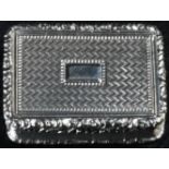 A George IV silver rounded rectangular vinaigrette, engine turned and applied with leafy borders,