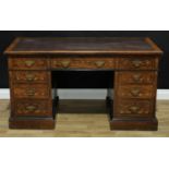 A late Victorian rosewood and marquetry twin pedestal desk, rectangular top with inset writing