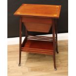 An Edwardian mahogany work table, rectangular top with twin hinged covers enclosing an emerald