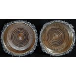 A pair of post-Regency Old Sheffield Plate shaped circular wine coasters, gadrooned acanthus