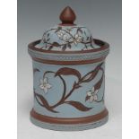 A Langley Ware tobacco jar and cover, designed by Mary Helen Goodyer, incised with scrolling daisies