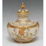 A Royal Worcester reticulated pot pourri vase and cover, decorated with floral sprigs, on a blush
