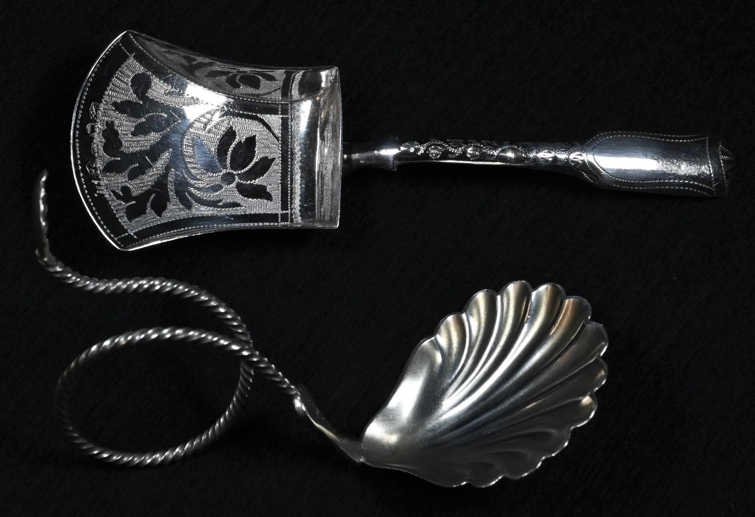 A Norwegian silver caddy spoon, shell bowl, curled ropetwist stem, 8.5cm long, Marius Hammer,