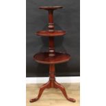 A George III style mahogany three-tier dumbwaiter, circular dished graduated plateaux, turned