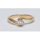 A contemporary diamond solitaire ring, round brilliant cut diamond approx 0.30ct, assessed clarity