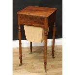 A 19th century mahogany rounded square work table, reeded top above a fitted drawer and basket