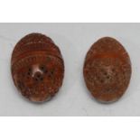 A 19th century French novelty coquilla nut bonbonniere, as an egg, typically carved and pierced with