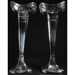 A pair of George V silver tapered square mantel vases, wavy borders pierced with leafy scrolls,