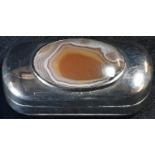 A 19th century agate mounted silver snuff box, probably Scottish, hinged cover set with a polished
