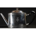 An 18th century Swiss silver oval teapot, hinged domed cover, bright-cut engraved borders, 23.5cm