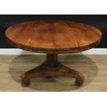 A George/William IV rosewood circular centre table, tilting top, columnar pillar, incurve canted