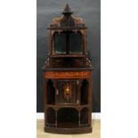 A late Victorian rosewood and marquetry corner salon cabinet, shaped top with bowed upstand, above a