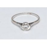 A diamond solitaire ring, round brilliant cut diamond approx 1.0ct, crown claw set, white metal