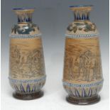 A pair of Doulton Lambeth spreading ovoid vases, designed by Florence E. Barlow, incised with