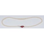 A graduated single strand pearl necklace, ranging from approx 3.5mm to 7.5mm diameter, united by a