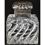 A Victorian silver mounted wrythen clear glass square inkwell, hinged fluted cover, 9cm high, Stuart