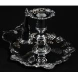 A William IV Rococo Revival silver chamberstick, the shaped base with bold shells and scroll