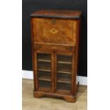 A Victorian burr walnut and marquetry rounded rectangular salon cabinet, rounded rectangular top