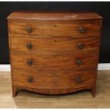 A Regency mahogany bow-fronted chest, moulded top above four long graduated cockbeaded drawers,