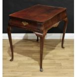 An 18th century mahogany silver table, rounded rectangular dished top with re-entrant angles,