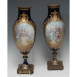 A pair of Chateau de Longpre Sevres style vases, signed, Polyet, each painted with courting couples,